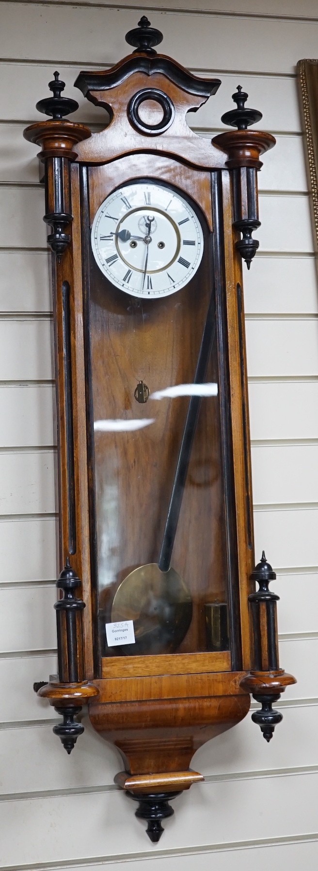 A late 19th century walnut and ebonised Vienna wall clock, height 118cm *Please note the sale commences at 9am.